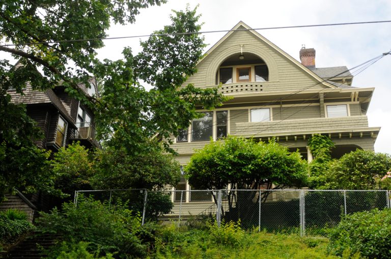 This Tuesday, June 24, 2014 photo shows the house built in 1892 that venture capitalist Kevin Rose has opted to sell to neighbors in northwest Portland instead of demolishing it. He initially planned to renovate the structure, but when that became costly, he decided to tear it down and build a modern home which outraged neighbors who didn't want the historic home demolished. Rose is a general partner for Google Ventures. (AP Photo/The Oregonian, Stephanie Yao Long)
