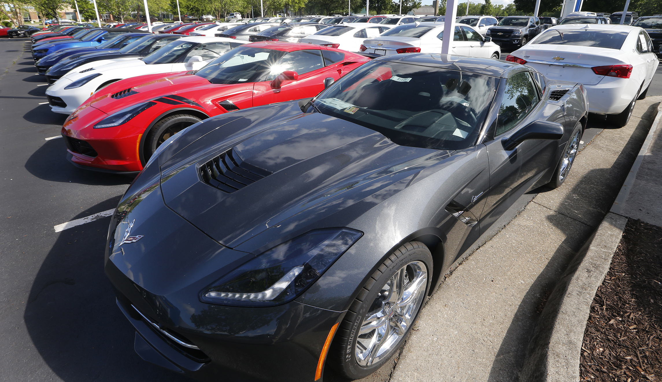 You’re not really getting a good deal on that new car, thanks to state laws