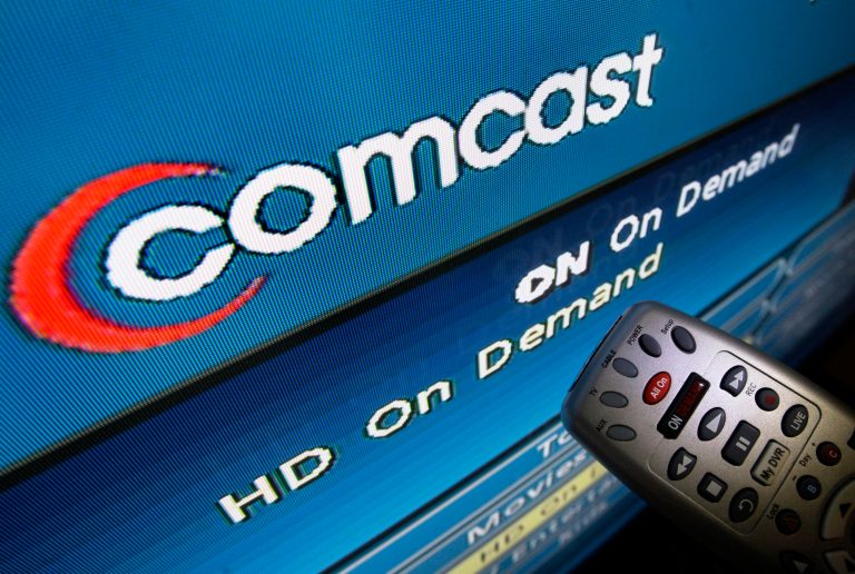 After years of bickering, Netflix and Comcast are working together to provide their subscribers with a more enjoyable experience when they're watching movies and television shows over high-speed Internet connections. (AP image)