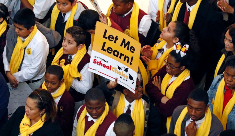 When charter schools reduce the likelihood that students commit crimes as adults, society spends less resources on policing, court cases, corrections programs, and prisons. (AP Photo/Rogelio V. Solis)