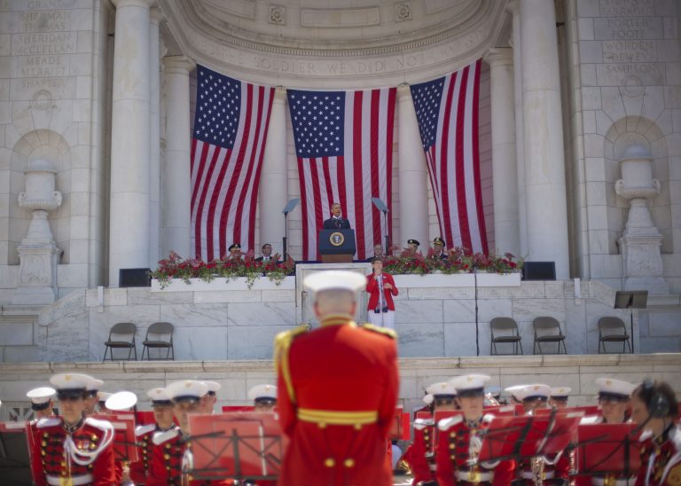 President Barack Obama speaks during a Memorial Day Observance at Arlington National Cemetery in Arlington, Va., Monday, May 25, 2015. Playing just below Obama in the Memorial Amphitheater are members of The President's Own, United States Marine Band. (AP Photo/Pablo Martinez Monsivais)