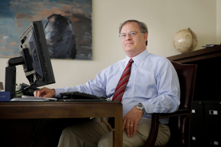 In this July 9, 2014 photo, economist David Levy poses for picture in his office in Mt. Kisco, N.Y. Levy, who oversees the Levy Forecast, a newsletter analyzing the economy that his family started in 1949, says the United States is likely to fall into a recession next year triggered by downturns in other countries, the first time in modern history. (AP Photo/Seth Wenig)