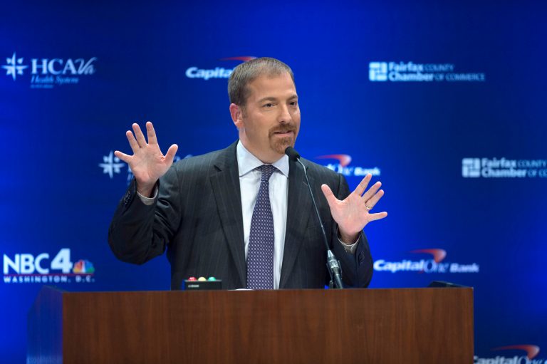 NBC's Chuck Todd moderates the debate with Virginia gubernatorial candidates Democrat Terry McAuliff and Republican Attorney General Ken Cuccinelli at tje Fairfax County Chamber of Commerce debate Wednesday, Sept. 25, 2013, in McLean, Va. (AP Photo/The Washington Post, Nikki Kahn, Pool)