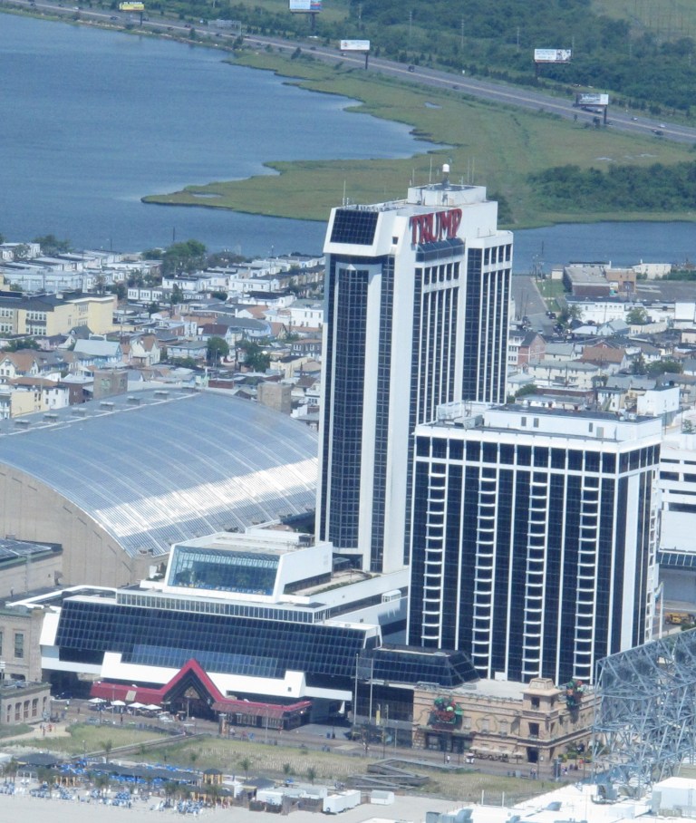 Trump Plaza Hotel and Casino in Atlantic City N.J., shown here on July 11, 2014, will shut down on Sept. 16, its parent company told The Associated Press on Saturday July 12, 2014. It would be the third Atlantic City casino to shut down this year, and more than 1,000 workers would lose their jobs. (AP Photo/Wayne Parry)