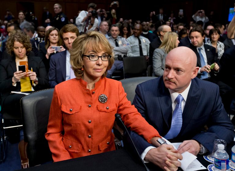 Former Arizona Rep. Gabrielle Giffords, who survived a gunshot to the head in 2011 during a mass shooting in Tucson, Ariz., sits ready with her husband, retired astronaut Mark Kelly, during a Senate Judiciary Committee hearing on Capitol Hill in Washington to discuss legislation to curb gun violence. (AP/J. Scott Applewhite)

