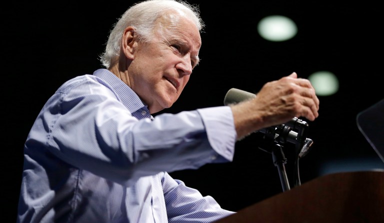 If the Virginia governor's mansion stays blue, Biden promised, the state will thrive. (AP Photo/Julio Cortez)