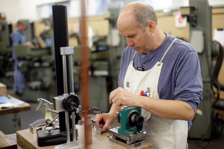 FILE - In this March 12, 2013 file photo, toolmakers work at The Rodon Group manufacturing facility in Hatfield, Pa. The Federal Reserve Bank of Philadelphia reports on manufacturing in the Philadelphia region on Thursday, July 17, 2014. (AP Photo/Matt Rourke, File)