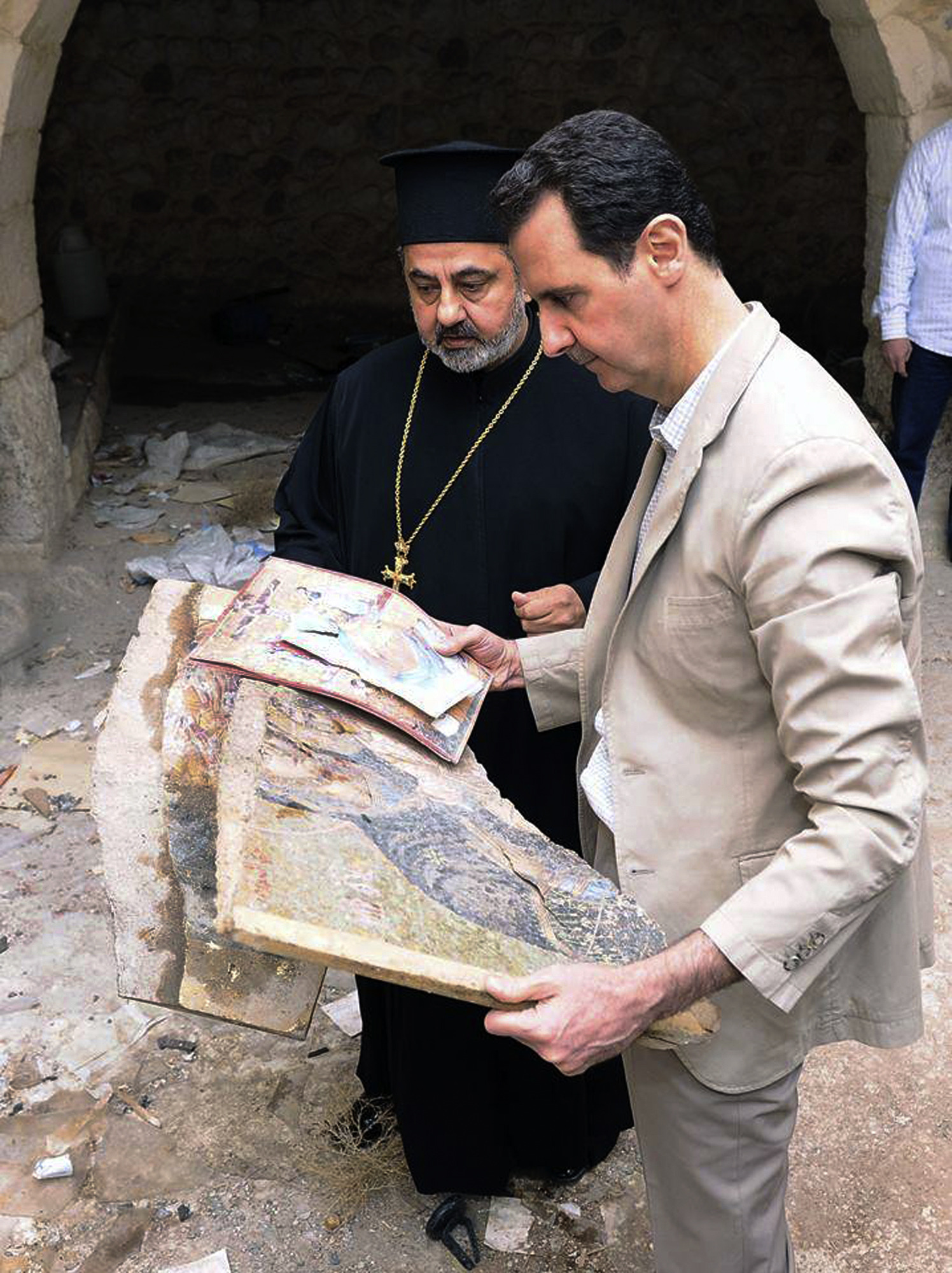 Ahead of vote, Syria’s Assad visits seized village