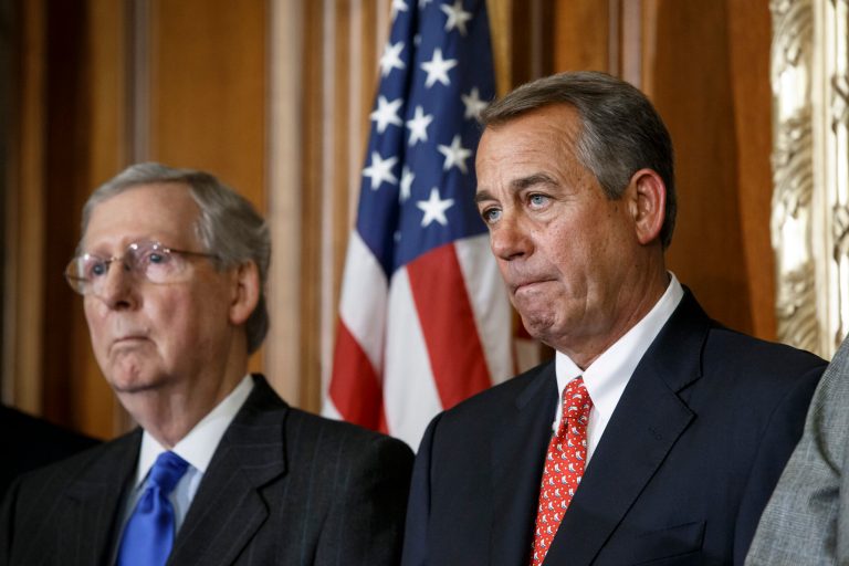 Speaker of the House John Boehner joined by Senate Majority Leader Mitch McConnell left, at the Capitol in Washington. (AP Photo/J. Scott Applewhite)