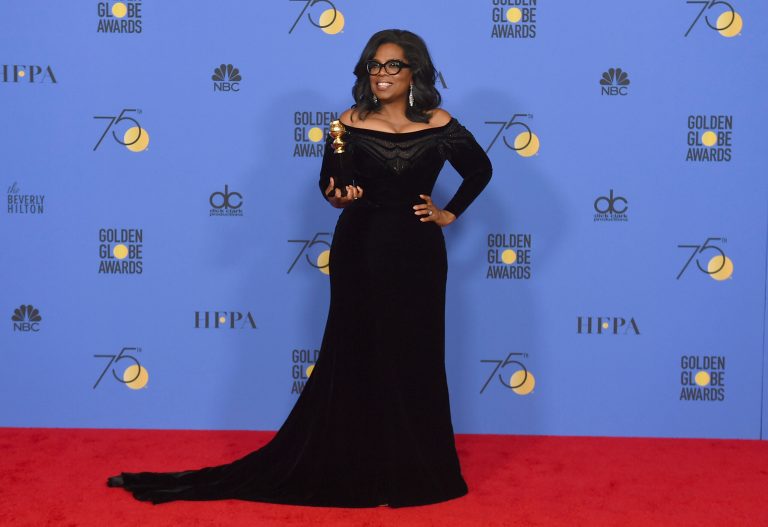 Oprah Winfrey poses in the press room with the Cecil B. DeMille Award at the 75th annual Golden Globe Awards at the Beverly Hilton Hotel on Sunday, Jan. 7, 2018, in Beverly Hills, Calif. (Photo by Jordan Strauss/Invision/AP)