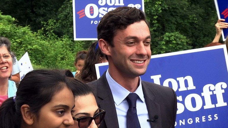 Democrat Jon Ossoff poses for a picture with supporters outside of the East Roswell Library in Roswell, Ga., Tuesday, May 30, 2017. He faces Republican Karen Handel in the GOP-leaning 6th Congressional District that stretches across greater Atlanta's northern suburbs. (AP Photo/Alex Sanz)