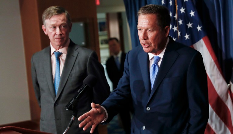 Ohio Gov. John Kasich, right, and Colorado Gov. John Hickenlooper are urging Congress to retain the federal healthcare law's unpopular individual mandate while seeking to stabilize individual insurance markets as legislators continue work on a long-term replacement law. (AP Photo/Carolyn Kaster, file)