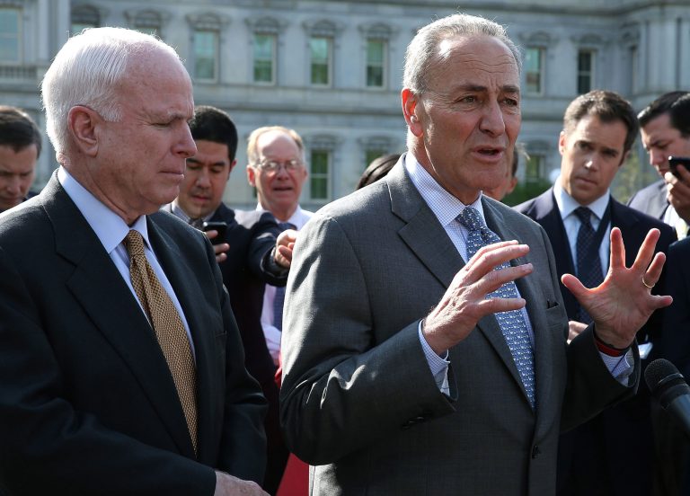 WASHINGTON, DC - APRIL 16:  Sen. Charles Schumer (D-NY) (R) and Sen. John McCain (R-AZ) speak to the media after meeting with President Barack Obama at the White House April 16, 2013 in Washington, DC. Senators McCain and Schumer briefed the president on the contents of their new immigration proposal.  (Photo by Mark Wilson/Getty Images)
