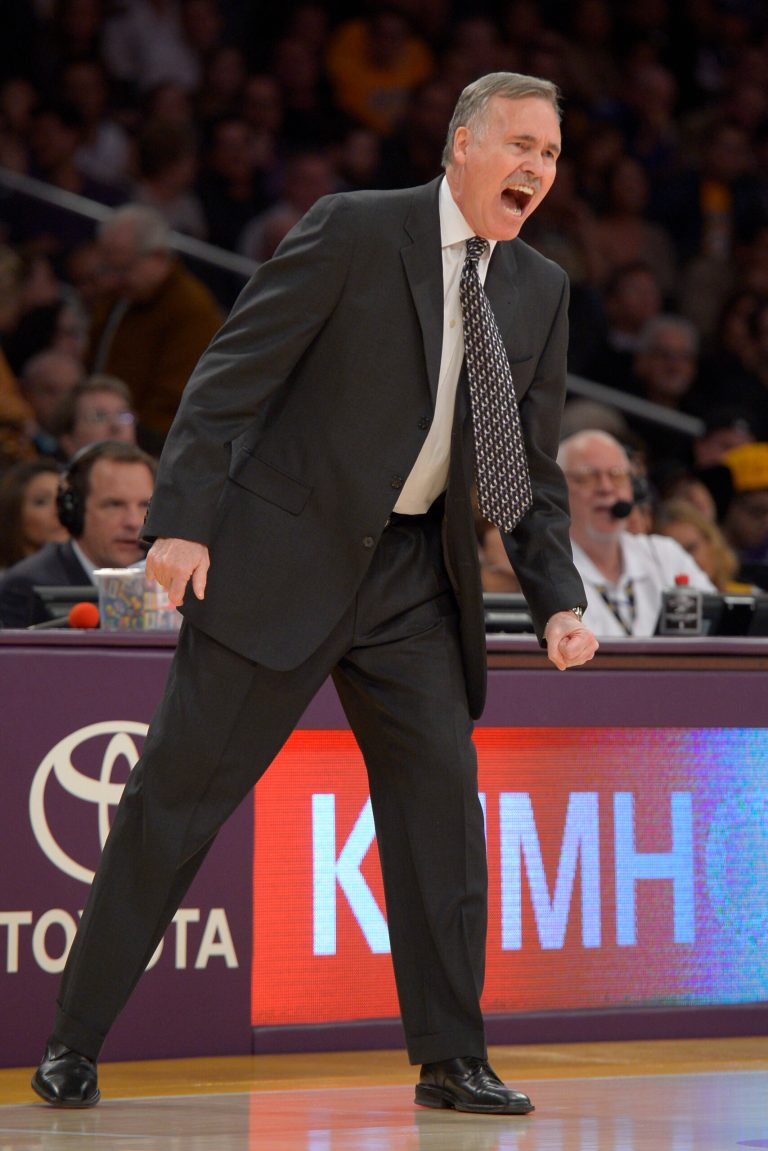   Los Angeles Lakers coach Mike D'Antoni yells to his team during the first half of their NBA basketball game against the Utah Jazz, Sunday, Dec. 9, 2012, in Los Angeles. (AP Photo/Mark J. Terrill)  