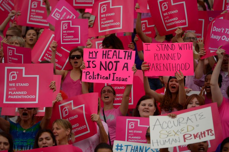 Planned Parenthood Action Council holds a community rally in Salt Lake City. (Leah Hogsten/The Salt Lake Tribune via AP)