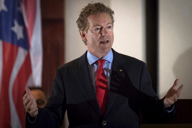 In this Aug. 11, 2017 photo, Sen. Rand Paul, R-Ky., speaks to supporters in Hebron, Ky. A man has been arrested and charged with assaulting and injuring Rand Paul. Kentucky State Police said in a news release Saturday, Nov. 4, 2017 that Paul suffered a minor injury when 59-year-old Rene Boucher assaulted him at his Warren County home on Friday afternoon. The release did not provide details of the assault or the nature of Paul's injury. In a statement, Paul spokeswoman Kelsey Cooper said the Republican senator was 