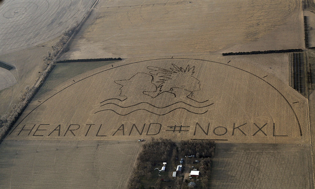 A huge crop art Image protesting the proposed Keystone XL pipeline covers an 80 acre corn field outside of Neligh, Nebraska, on Saturday. (Photo by Lou Dematteis / Spectral Q)
