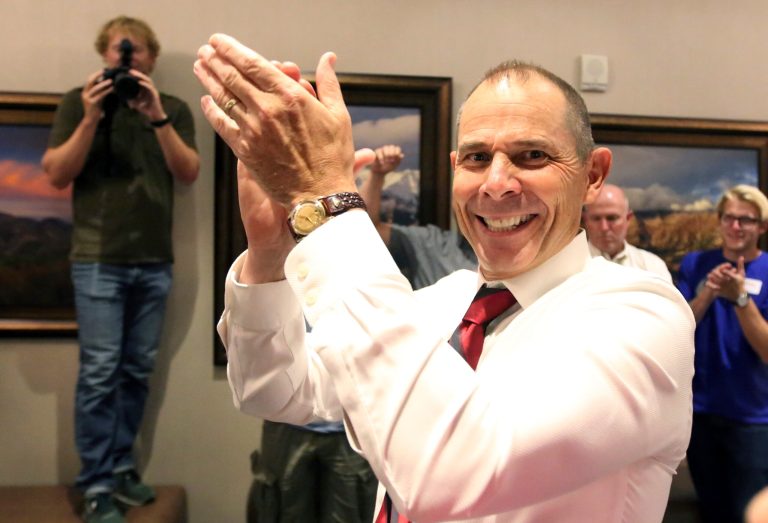 Provo Mayor John Curtis celebrates after the first results come in after the polls closed during his primary election night watch party Tuesday, Aug. 15, 2017, in Provo, Utah. The winner of a three-way Republican primary Tuesday, Aug. 15, 2017, in Utah will become the favorite to win the November special election and fill the congressional seat recently vacated by Jason Chaffetz. (AP Photo/Rick Bowmer)