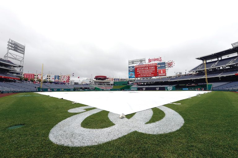 Patrick McDermott/Getty Images
The Nationals changed their policy on Tuesday's postponed game after many fans were angry about having to attend Thursday's make-up game to utilize the tickets.