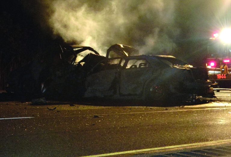 This photo provided by the Indiana State Police shows a fatal crash Thursday, Aug. 16, 2012, near Michigan City, Ind., which killed the drivers of two cars. Police say they found the bodies of a woman and her two children at a suburban Detroit home while they were trying to notify family members that a man had died in the crash. Identities have not been released. (AP Photo/Indiana State Police)