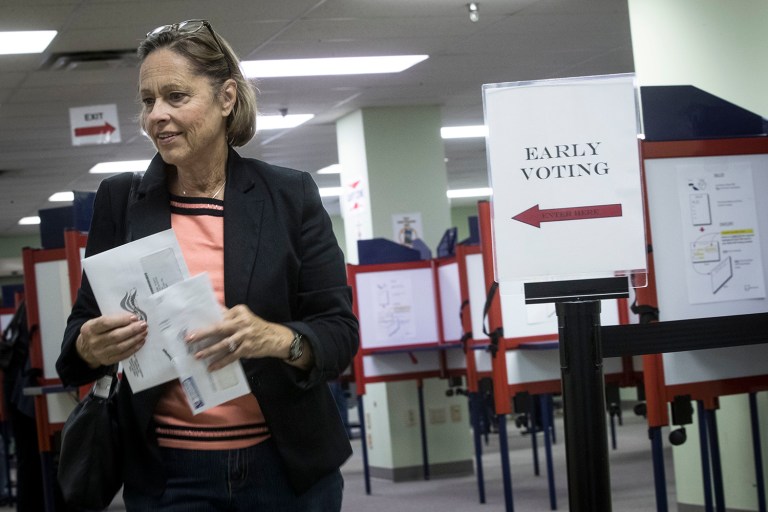 Early ballots and voter registration numbers show a surge of Democrats in the important swing state of Florida. (AP Photo/John Minchillo)