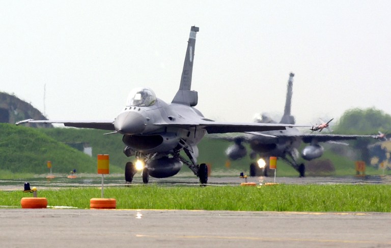 Two U.S.-made F16 jet fighters. Though the U.S. officially turned a cold shoulder to Taiwan in 1979, America has helped outfit the armory with everything from machine guns to F16 Fighting Falcons.(AP Photo/Jerome Favre)