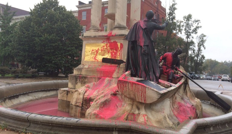 Officials say they received a report that the monument had been vandalized around 6:30 a.m. and had been painted with the words, 
