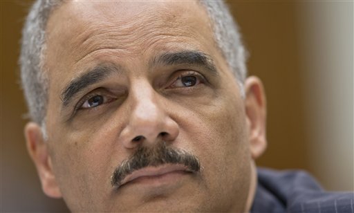 FILE - In this May 15, 2013 file photo, Attorney General Eric Holder, the nation's top law enforcement official, testifies on Capitol Hill in Washington.  (AP Photo/J. Scott Applewhite, File)
