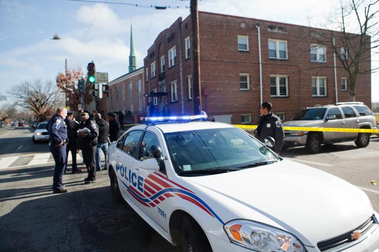 Police investigate a shooting incident in Southeast Washington on Thursday that injured three juveniles. 