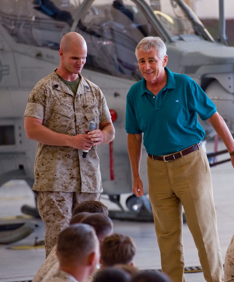 Secretary of Defense Chuck Hagel, right, takes a question from Gunnery Sgt. Wilburn Jeffrey during a question and answer period with Marines at Camp Pendleton on Tuesday Aug. 12, 2014. Hagel announced the deployment of another 130 U.S. troops to Iraq in remarks to Marines at this Southern California base on the final stop of a weeklong, around-the-world trip that also took him to India, Germany and Australia. (AP Photo/The Orange County Register, Paul Rodriguez)
