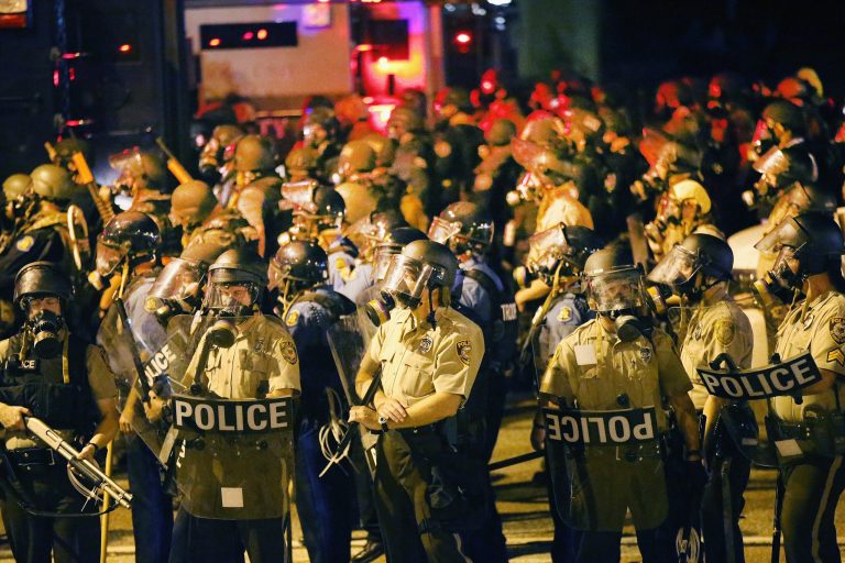 Police advance on demonstrators on August 17. the crowd was protesting the killing of teenager Michael Brown in Ferguson, Missouri. (Getty images/Scott Olson)