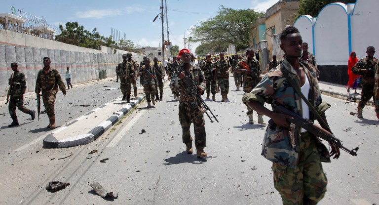 Above, Somali soldiers patrol following a blast near the presidential palace in the capital Mogadishu, Somalia on Aug. 30, 2016. U.S. officials in Somalia have been ordered to leave Mogadishu due to the risk of terrorist attacks, the State Department announced in a bulletin on Saturday. (AP Photo/Farah Abdi Warsameh)