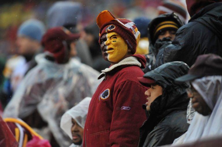 A fan of the Washington Redskins watches the game against the Tampa Bay Buccaneers at FedExField on December 12, 2010 in Landover, Maryland. (Larry French/Getty Images)