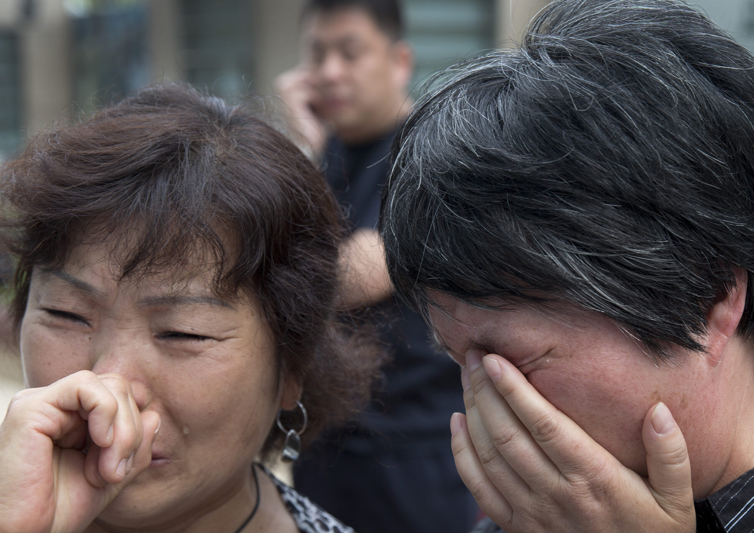 Families of Flight 370 passengers seek information