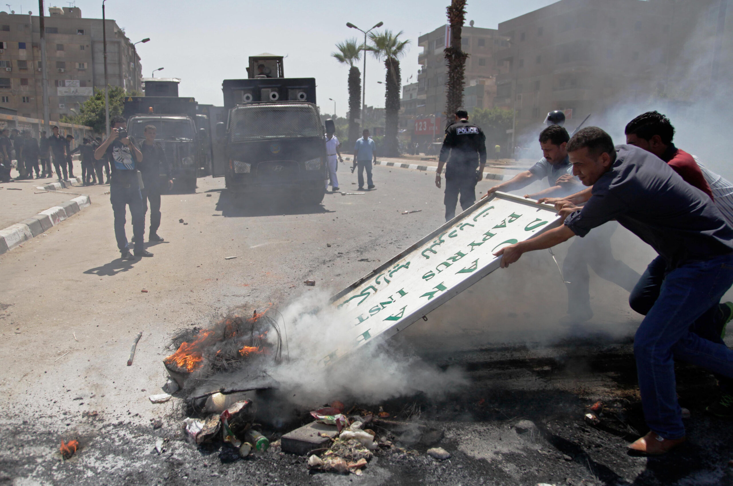 Clashes between Egypt troops, protesters kill teen