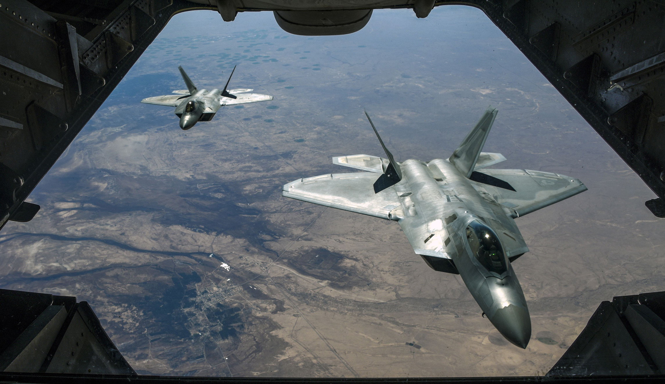 American-led coalition forces conduct airstrikes against pro-Assad regime forces in Syria