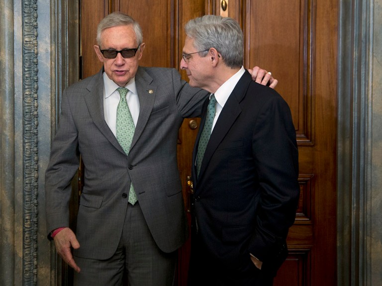 Senate Minority Leader Harry Reid, D-Nev., left, puts his arm around Supreme Court nominee Merrick Garland during a meeting in his office on Capitol Hill in Washington, Thursday, March 17, 2016. (AP Photo/Manuel Balce Ceneta)