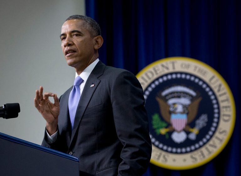 President Barack Obama gestures as he speaks during an Expanding College Opportunity event in the South Court Auditorium in the Eisenhower Executive Office Building on the White House complex, Thursday, Jan. 16, 2014, in Washington. (AP Photo/Carolyn Kaster)