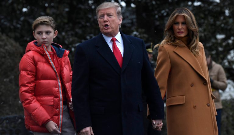 President Donald Trump, center, first lady Melania Trump, right, and their son Barron Trump, left.