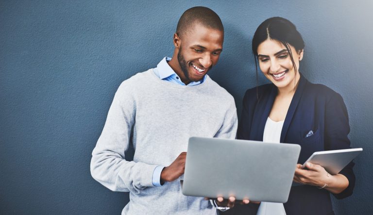 Studio shot of young business people using 