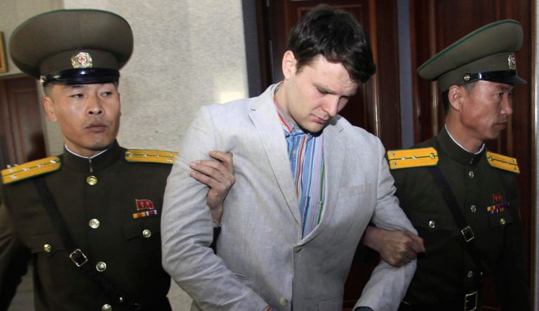 March 16, 2016: American student Otto Warmbier, center, is escorted at the Supreme Court in Pyongyang, North Korea. 