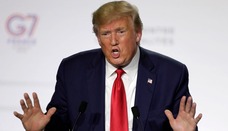 President Donald Trump gestures during a press conference on the third and final day of the G-7 summit in Biarritz, France.
