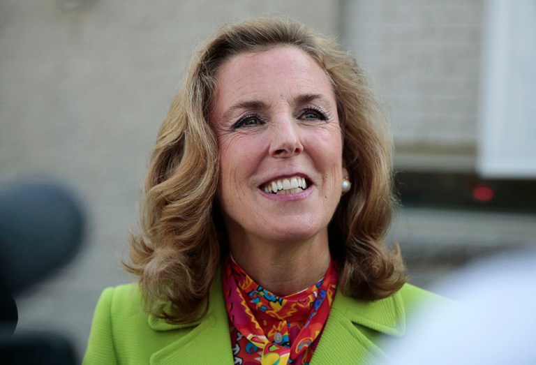 Katie McGinty addresses a reporter's question after casting her vote Tuesday, April 26, 2016, in Wayne, Pa. Former Congressman Joe Sestak looks to hold off McGinty, the party-endorsed candidate, and win the Democratic nomination for U.S. Senate, setting up a rematch with the Republican incumbent Pat Toomey. (AP Photo/Jacqueline Larma)