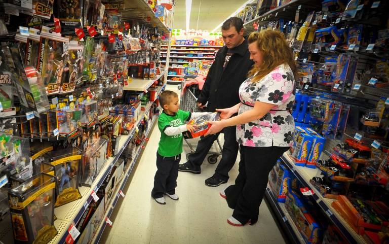 Many families on limited budgets rely on layaways, which typically does not place an additional fee like a credit card. (AP Photo/Dave Weaver)
