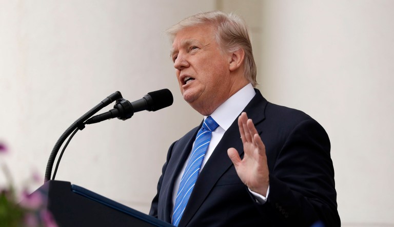 President Trump tweeted that he would announce his decision Thursday, along with his campaign slogan, 