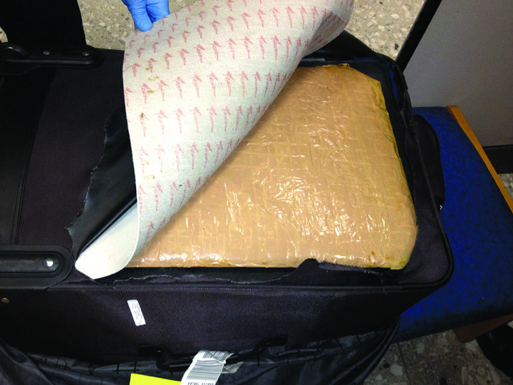 Officials: 11 pounds of heroin found in woman’s suitcase at Dulles