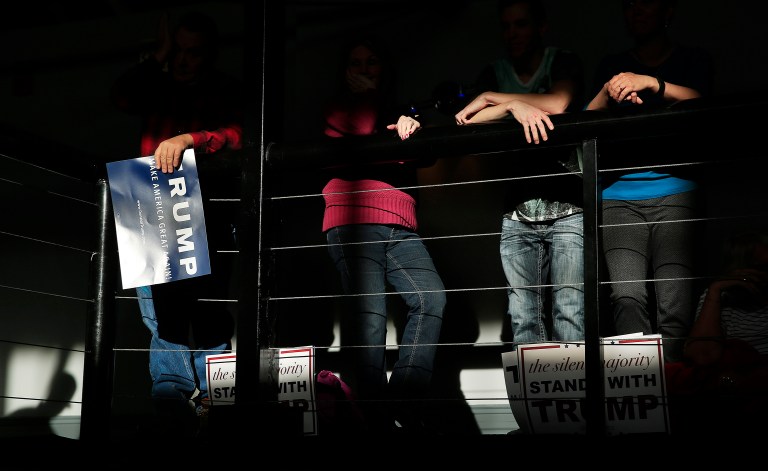 Which states are voting differently from demographic projections? (AP Photo/John Locher)