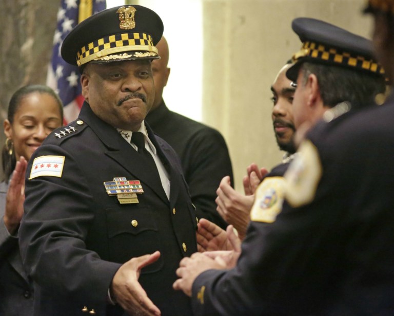 The Chicago police department will add nearly 1,000 new officers to the force over the next two years. (AP Image)