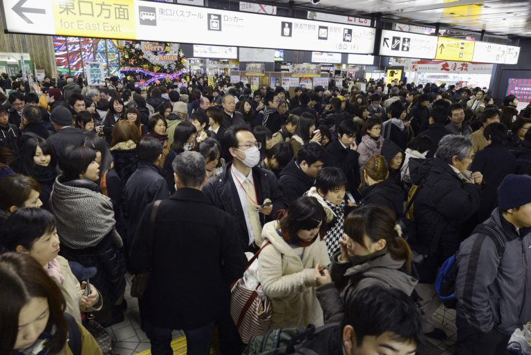   People crowd at Sendai railway station in Sendai, Miyagi Prefecture, Friday, Dec. 7, 2012 after trains were halted following a strong earthquake struck off the coast of northeastern Japan. It is the same region that was hit by a massive earthquake and tsunami last year. (AP Photo/Kyodo News) JAPAN OUT, MANDATORY CREDIT, NO LICENSING IN CHINA, FRANCE, HONG KONG, JAPAN AND SOUTH KOREA  