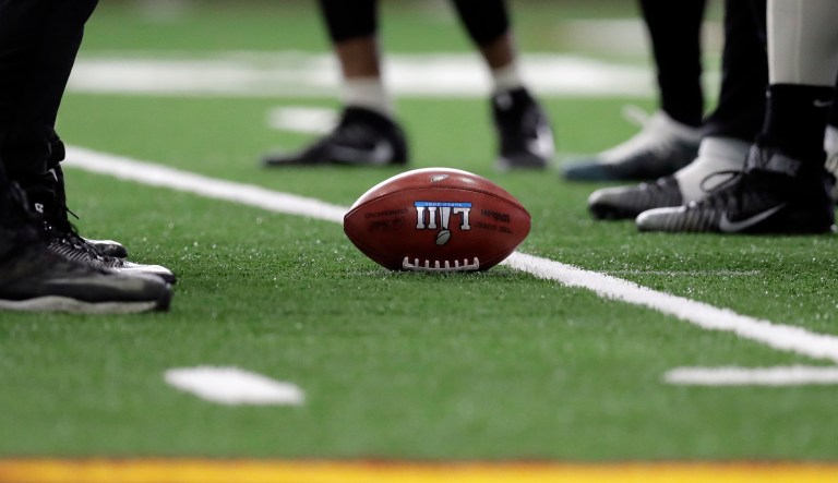 The nation could use four quarters of peace and quiet as the Philadelphia Eagles take on the New England Patriots. (AP Photo/Eric Gay)